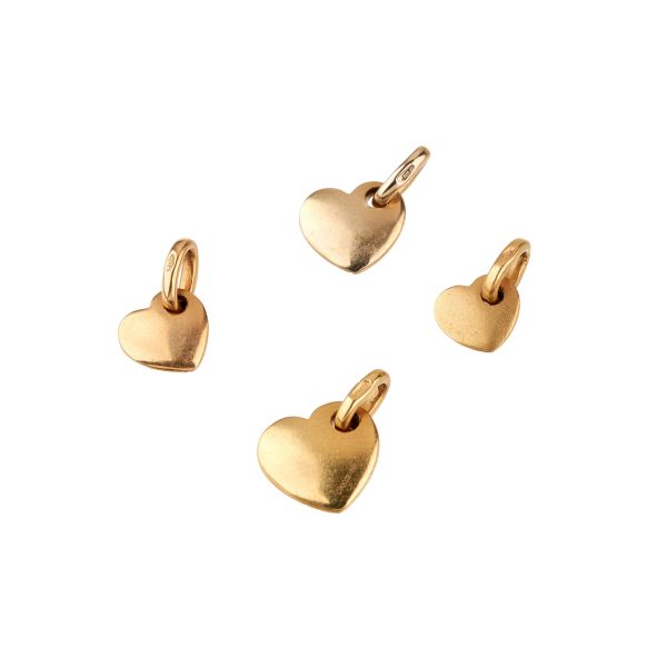 Pomellato - 



POMELLATO FOUR HEART-SHAPED CHARMS IN 18KT YELLOW GOLD