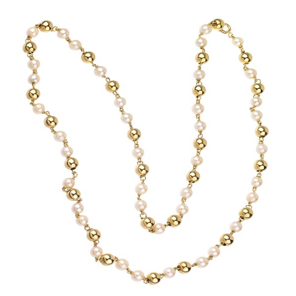 



LONG PEARL NECKLACE IN 18KT YELLOW GOLD