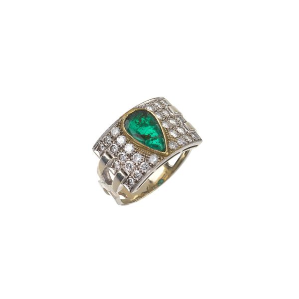 



EMERALD AND DIAMOND BAND RING IN 14 GOLD