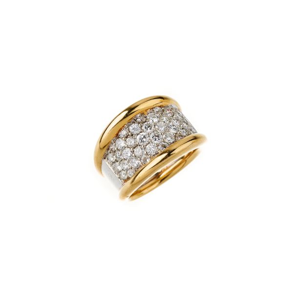 



DIAMOND BAND RING IN 18KT TWO TONE GOLD