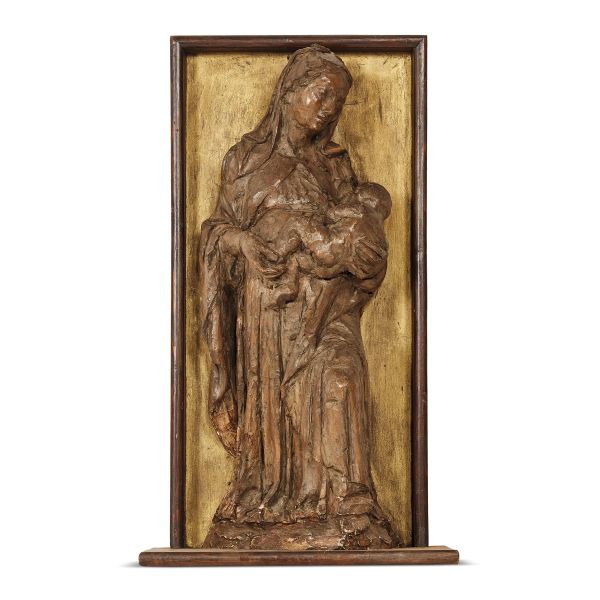 



Attributed to Alceo Dossena, Madonna with Child, circa 1920, patinated and partially gilt terracotta relief