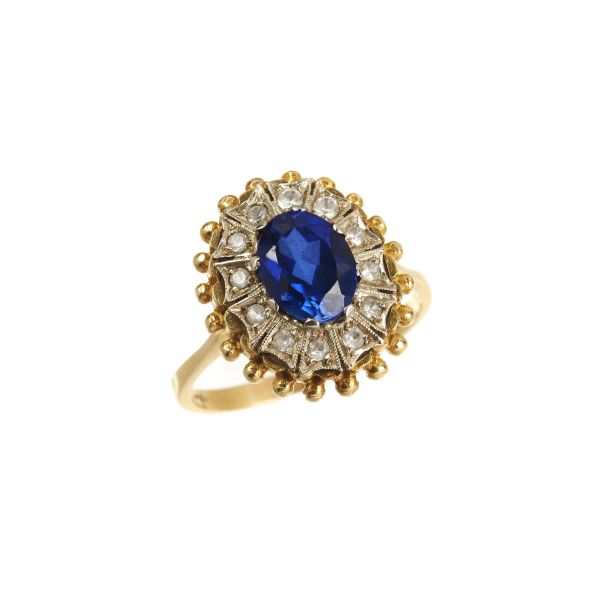 



BLUE AND COLORLESS STONE RING IN 18KT TWO TONE GOLD