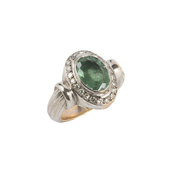 EMERALD AND DIAMOND RING IN 18KT TWO TONE GOLD
