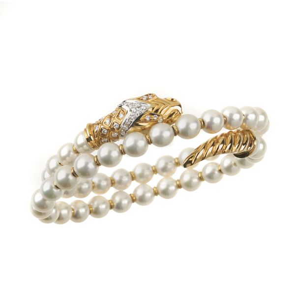 



BRACCIALE RIGIDO A SERPE