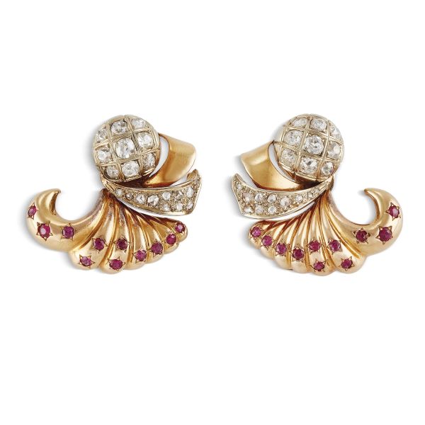 



RUBY AND DIAMOND VOLUTE CLIP EARRINGS IN 18KT TWO TONE GOLD
