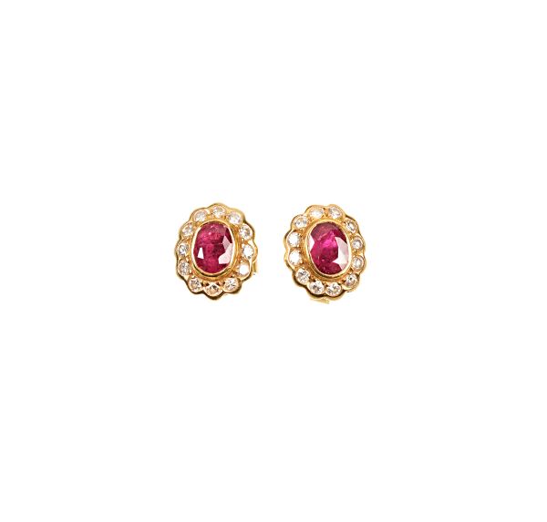 RUBY AND DIAMOND PAIR OF 18KT YELLOW GOLD STUD EARRINGS
