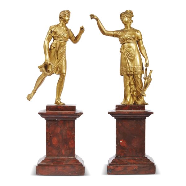 French, first half 19th century, Apollo and Hebe, gilt bronze, h. 20,8 cm, mounted on a plinth base in a red marble, h. 36 cm (overall)