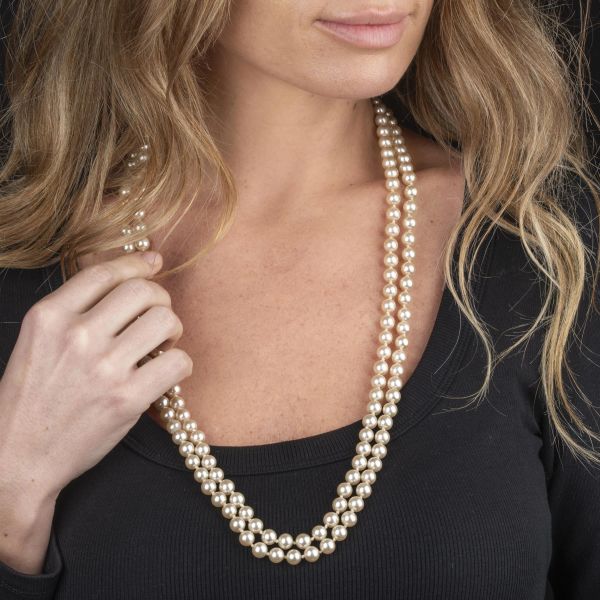 LUNGA COLLANA CON IMITAZIONE DI PERLE E ANELLO