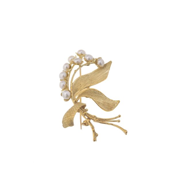 



PEARL FLOWERING-BRANCH BROOCH IN 18KT YELLOW GOLD