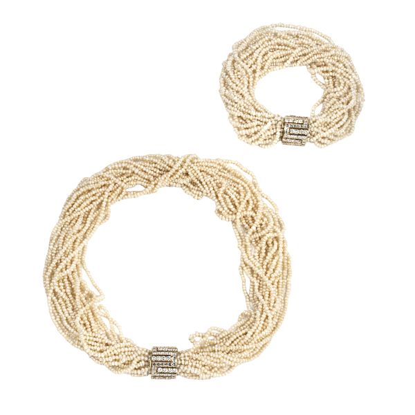 DEMI PARURE CON PERLE E DIAMANTI