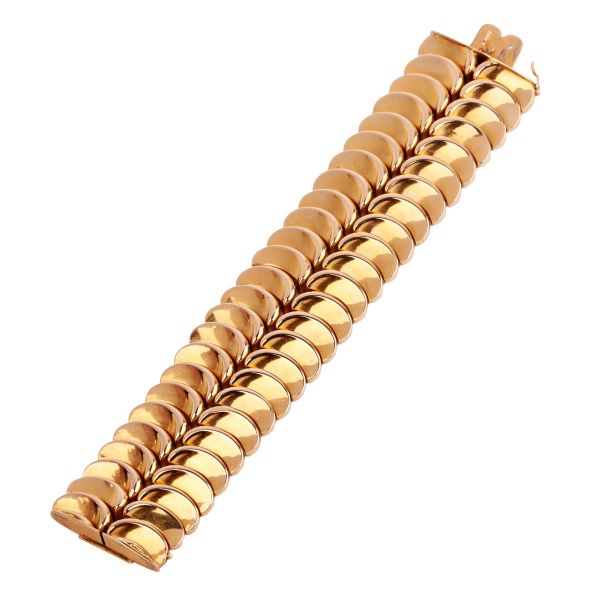 



WIDE BAND BRACELET IN 18KT YELLOW GOLD