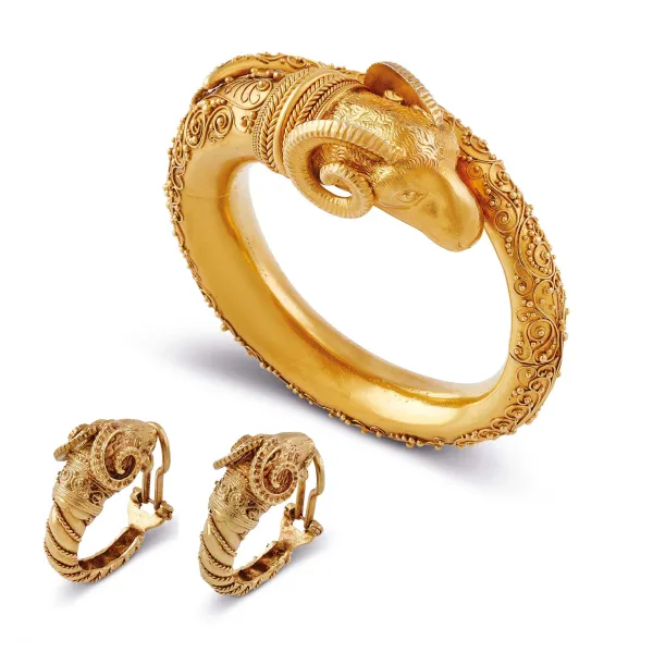 Zolotas - 



ZOLOTAS RAM-SHAPED DEMI PARURE IN 22 GOLD