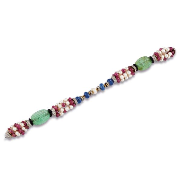 



SCAVIA PEARL EMERALD RUBY SAPPHIRE AND DIAMOND BRACELET IN 18KT TWO TONE GOLD