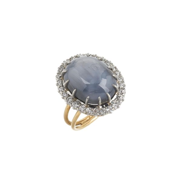 STAR SAPPHIRE AND DIAMOND RING IN 18KT YELLOW GOLD AND PLTINUM
