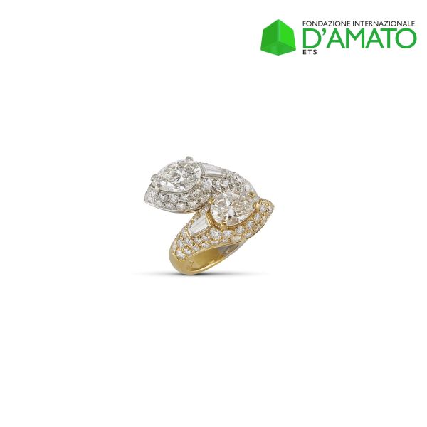 BULGARI CONTRARI&Eacute; DIAMOND RING IN PLATINUM AND 18KT YELLOW GOLD