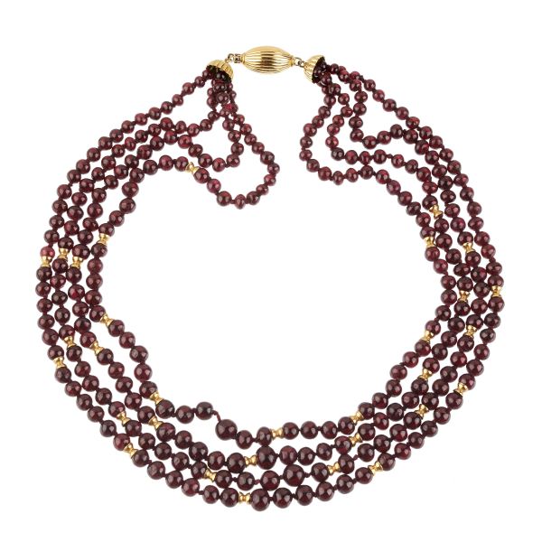 



GARNET NECKLACE IN 18KT YELLOW GOLD