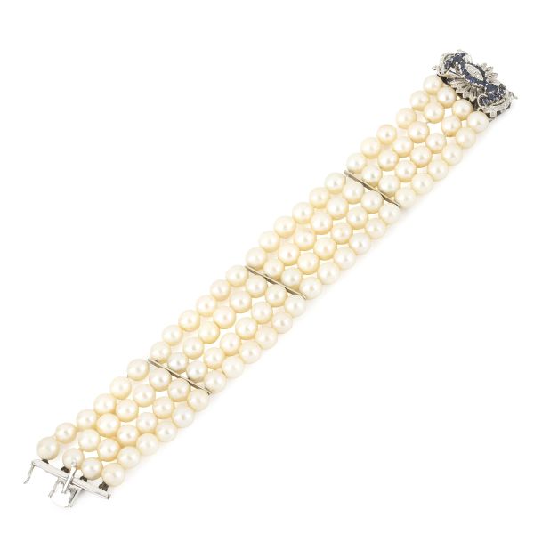 



BRACCIALE CON PERLE, ZAFFIRI E DIAMANTI