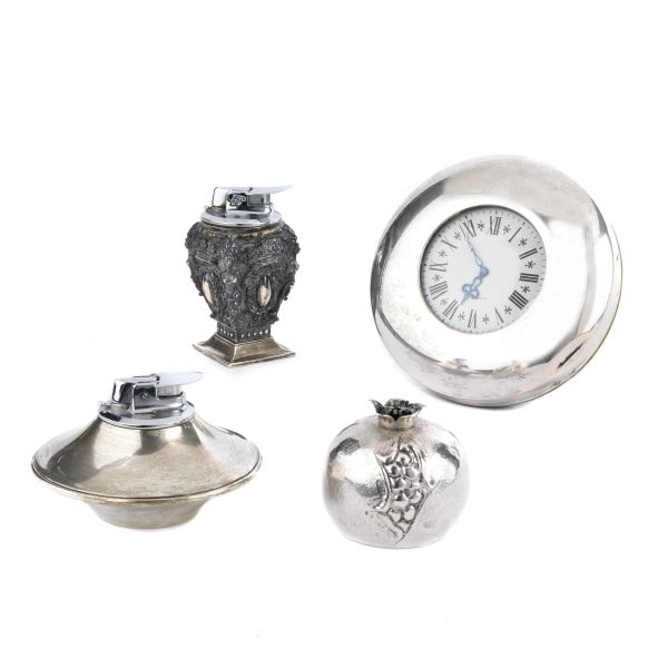 THREE SILVER-LINED TABLE LIGHTERS AND A TABLE CLOCK, 20TH CENTURY