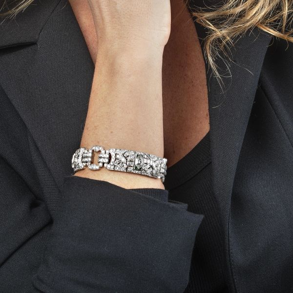 BRACCIALE A FASCIA CON DIAMANTI E SMERALDI