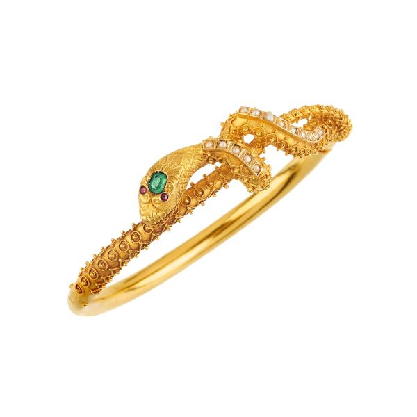 



SNAKE-SHAPED BANGLE BRACELET IN 18KT YELLOW GOLD