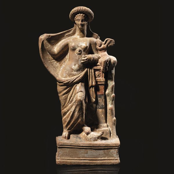 



STATUETTA FEMMINILE CON EROS