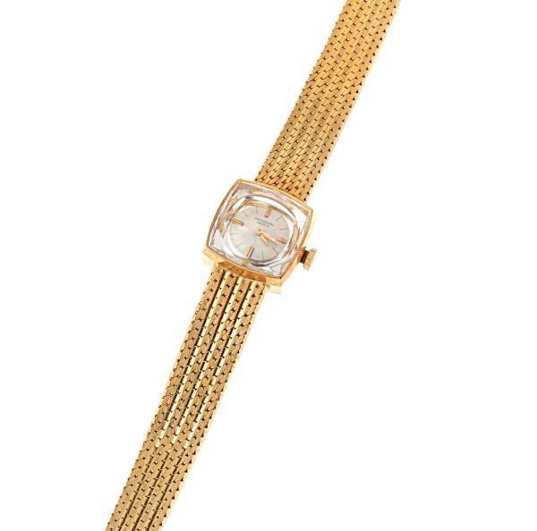 Universal Geneve - 



UNIVERSAL GENEVE LADY'S WATCH IN YELOW GOLD 