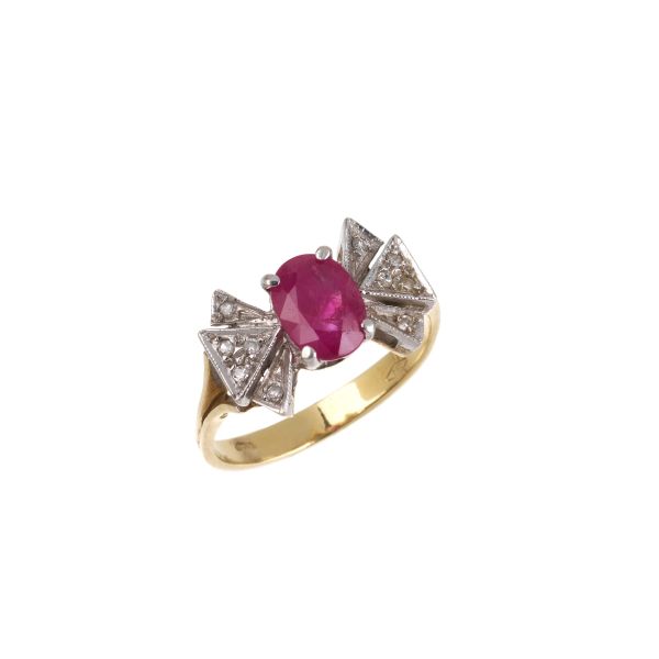 RUBY AND DIAMOND RIBBON RING IN 18KT TWO TONE GOLD