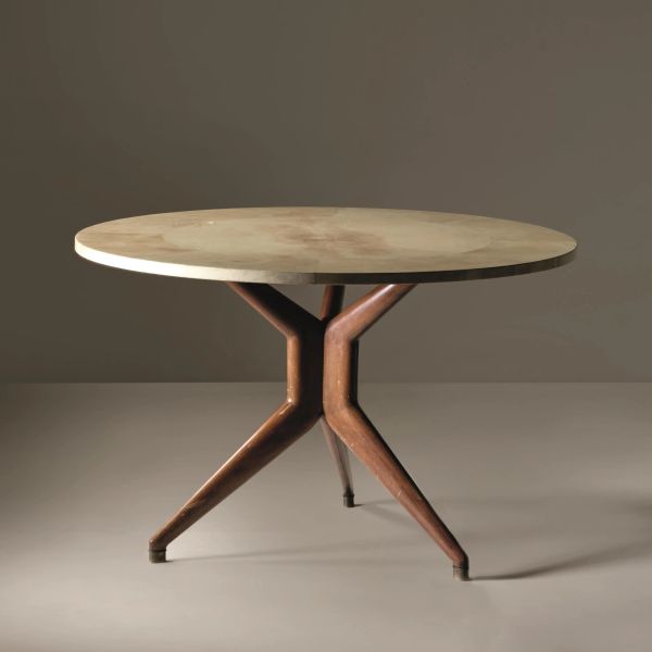 



ROUND TABLE, WOODEN STRUCTURE, PERGAMEN TOP 