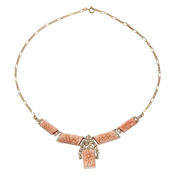 



COLLANA CON CORALLO ROSA E DIAMANTI