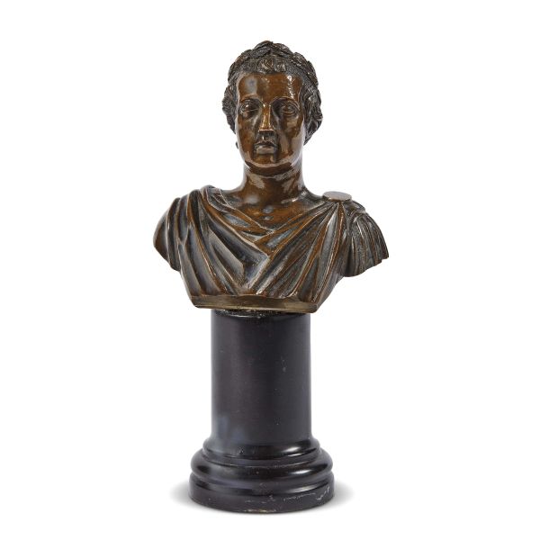 Neoclassical period, A bust of a Emperor, bronze, h. 11 cm on a marble base, 19,5x10x7 cm (overall)