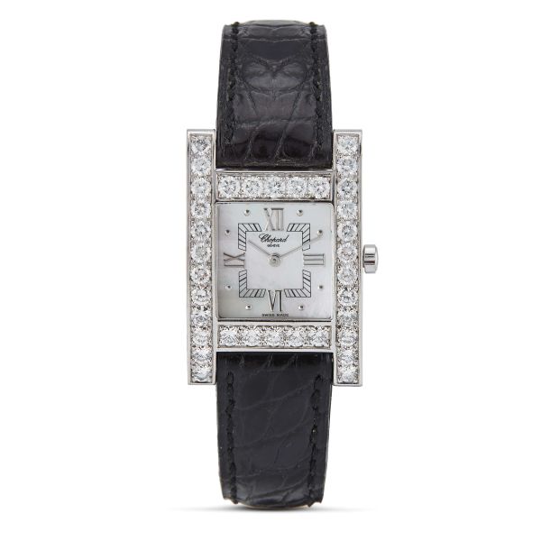 CHOPARD LADY'S WATCH IN 18KT WHITE GOLD AND MOTHER OF PEARL