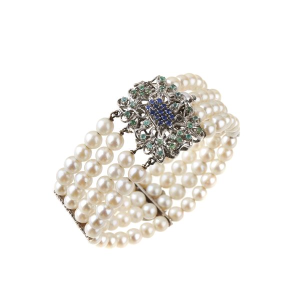 



PEARL AND COLOURED STONE BANGLE BRACELET IN 18KT WHITE GOLD