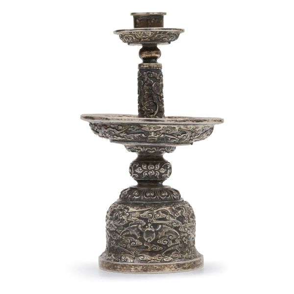 A SILVER CANDLESTICK WITH CLOUD-AND-BAT MOTIF, CHINA, QING DYNASTY, 20TH CENTURY 