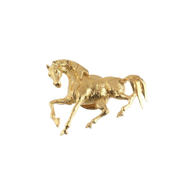HORSE-SHAPED BROOCH IN 18KT YELLOW GOLD