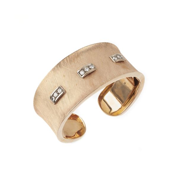 



WIDE BAND BANGLE BRACELET IN 18KT TWO TONE GOLD