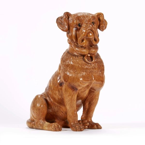 AN ENGLISH FIGURE OF A SITTING DOG, 20TH CENTURY