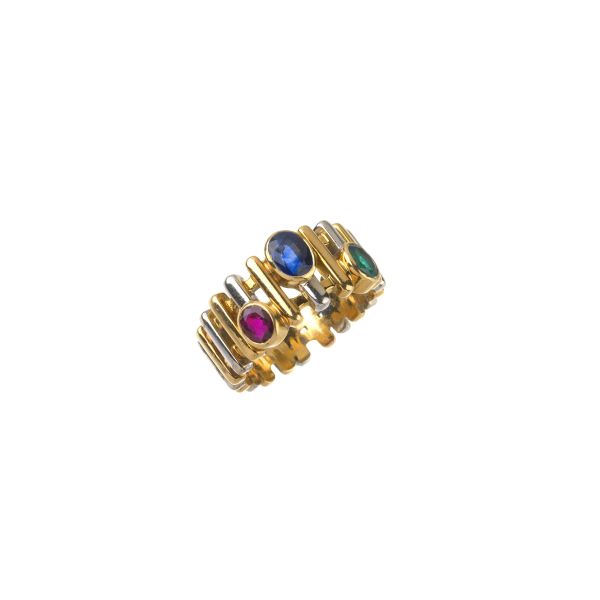 



COLOURED STONE BAND RING IN 18KT TWO TONE GOLD
