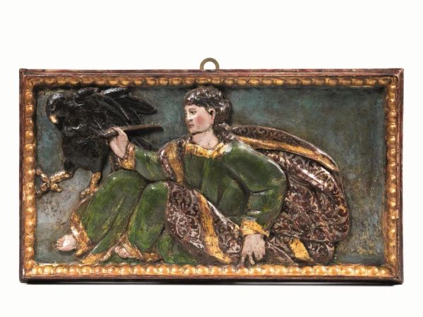  Bassorilievo, Spagna, sec. XVIII,  in legno intagliato e dipinto raffigurante San Luca, cm 31x57                