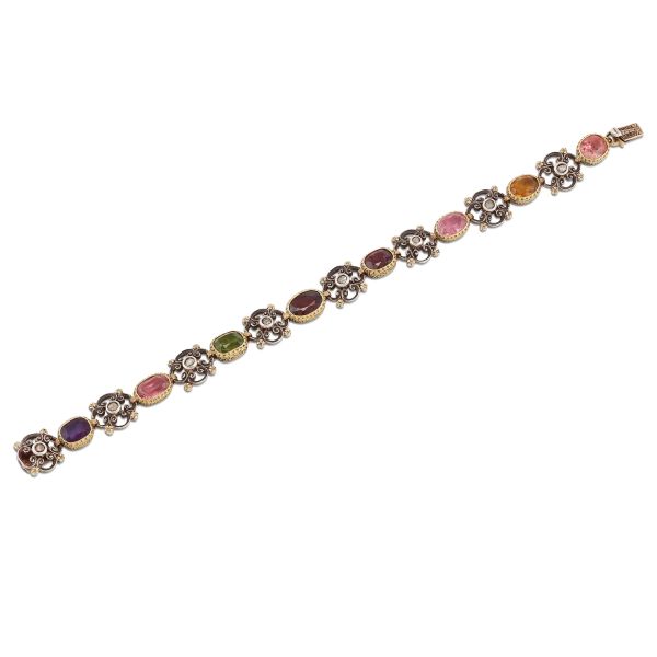 Buccellati - 



BUCCELLATI MULTI GEM CHAIN BRACELET IN GOLD AND SILVER 