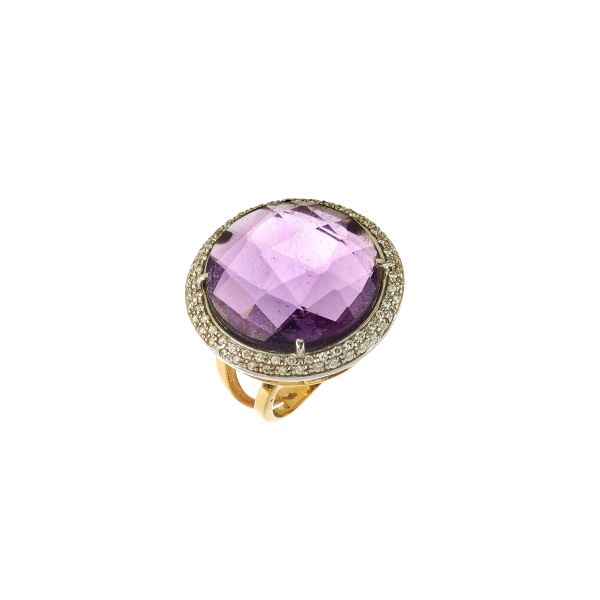 



BIG AMETHYST RING IN 18KT TWO TONE GOLD