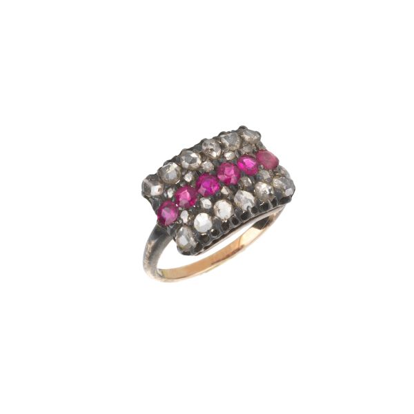 SYNTHETIC RUBY AND DIAMOND RING IN SILVER AND GOLD