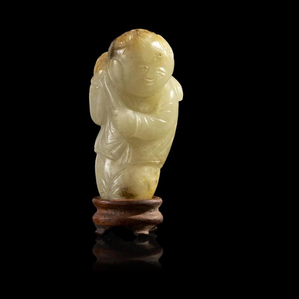 



A JADE CARVING OF A BOY, CHINA, QING DYNASTY, 19TH CENTURY 