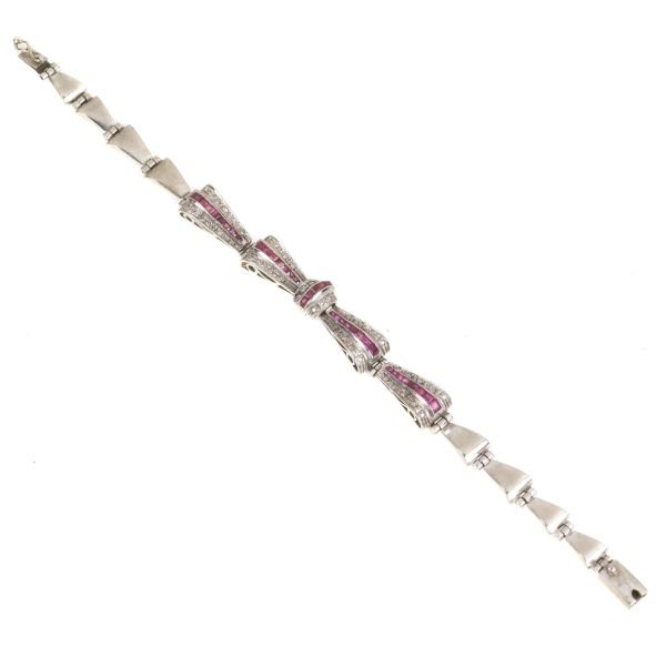 RIBBON-SHAPED RUBY AND DIAMOND BRACELET IN SILVER AND GOLD