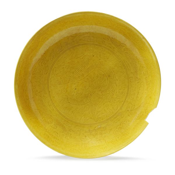 



A YELLOW-GLAZED 'DRAGON' DISH, CHINA, KANGXI PERIOD, 18TH CENTURY