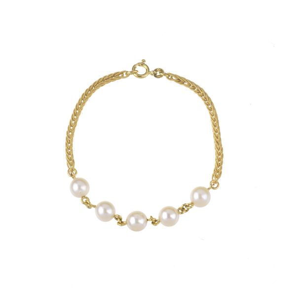 PEARL BRACELET IN 18KT YELLOW GOLD