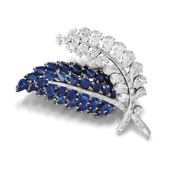 



SAPPHIRE AND DIAMOND LEAF BROOCH IN PLATINUM AND 18KT WHITE GOLD