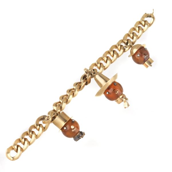 CHAIN BRACELET WITH CHARMS IN 18KT YELLOW GOLD AND SILVER