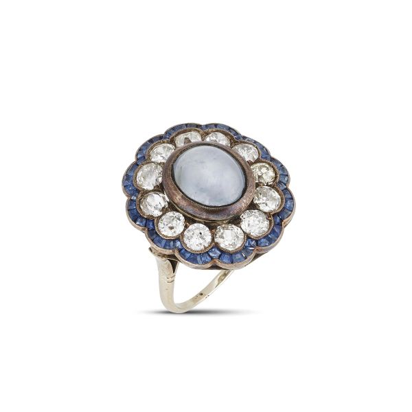 



SAPPHIRE AND DIAMOND FLOWER RING IN SILVER AND GOLD