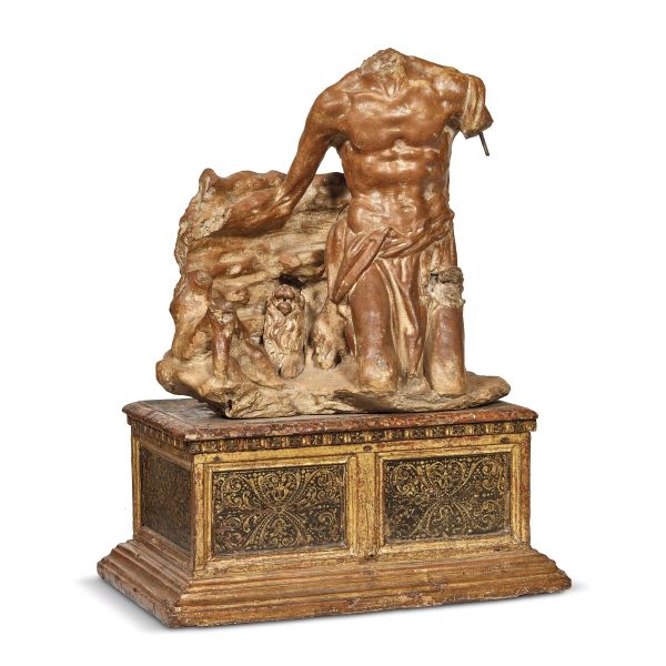 Tuscan, circa 1495-1520, Saint Jerome penitent, terracotta on a lacquered and gilt wooden base, 40x36x26 cm, (base 20x44x32 cm)
