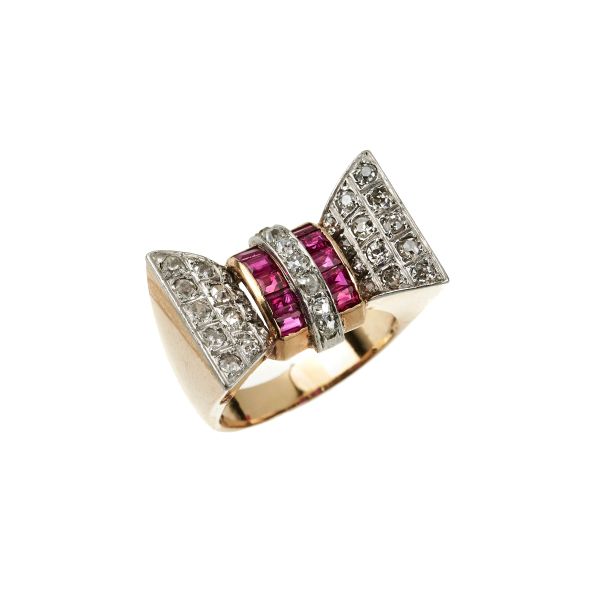 



RUBY AND DIAMOND RIBBON RING IN 18KT ROSE GOLD AND PLATINUM
